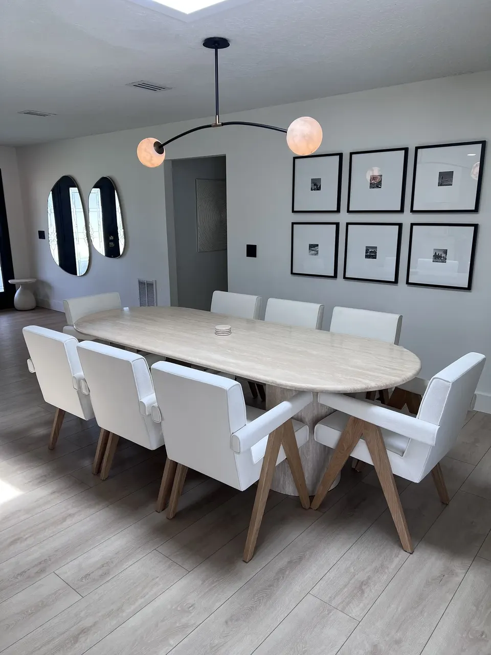 Modern multi-light fixture installed over a Jacksonville dining area