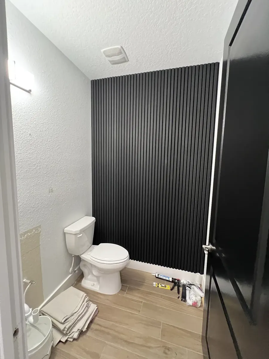 Half bath prepared for the feature wall and vanity installation
