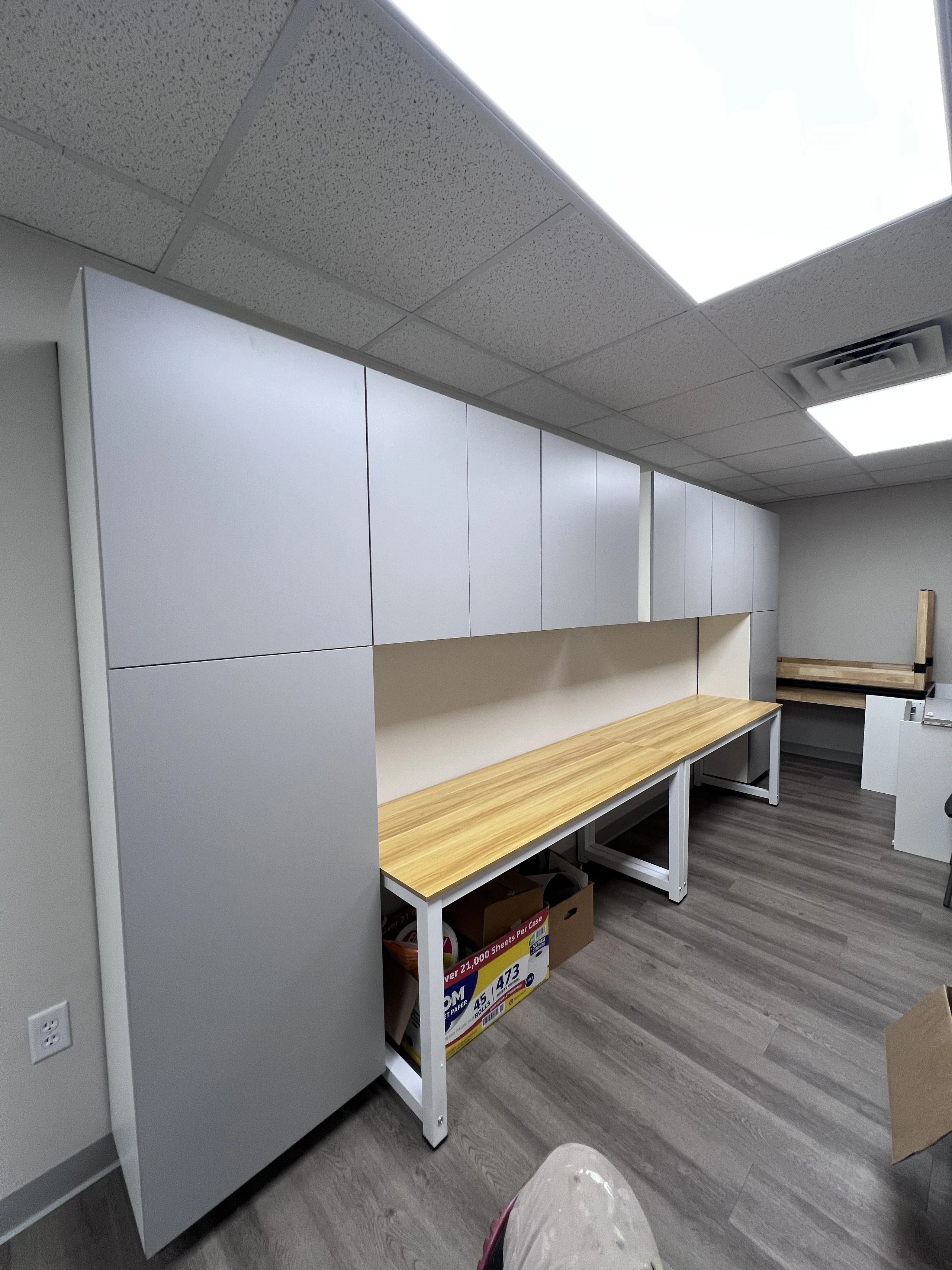 Finished row of white IKEA wall cabinets in Jacksonville, Florida