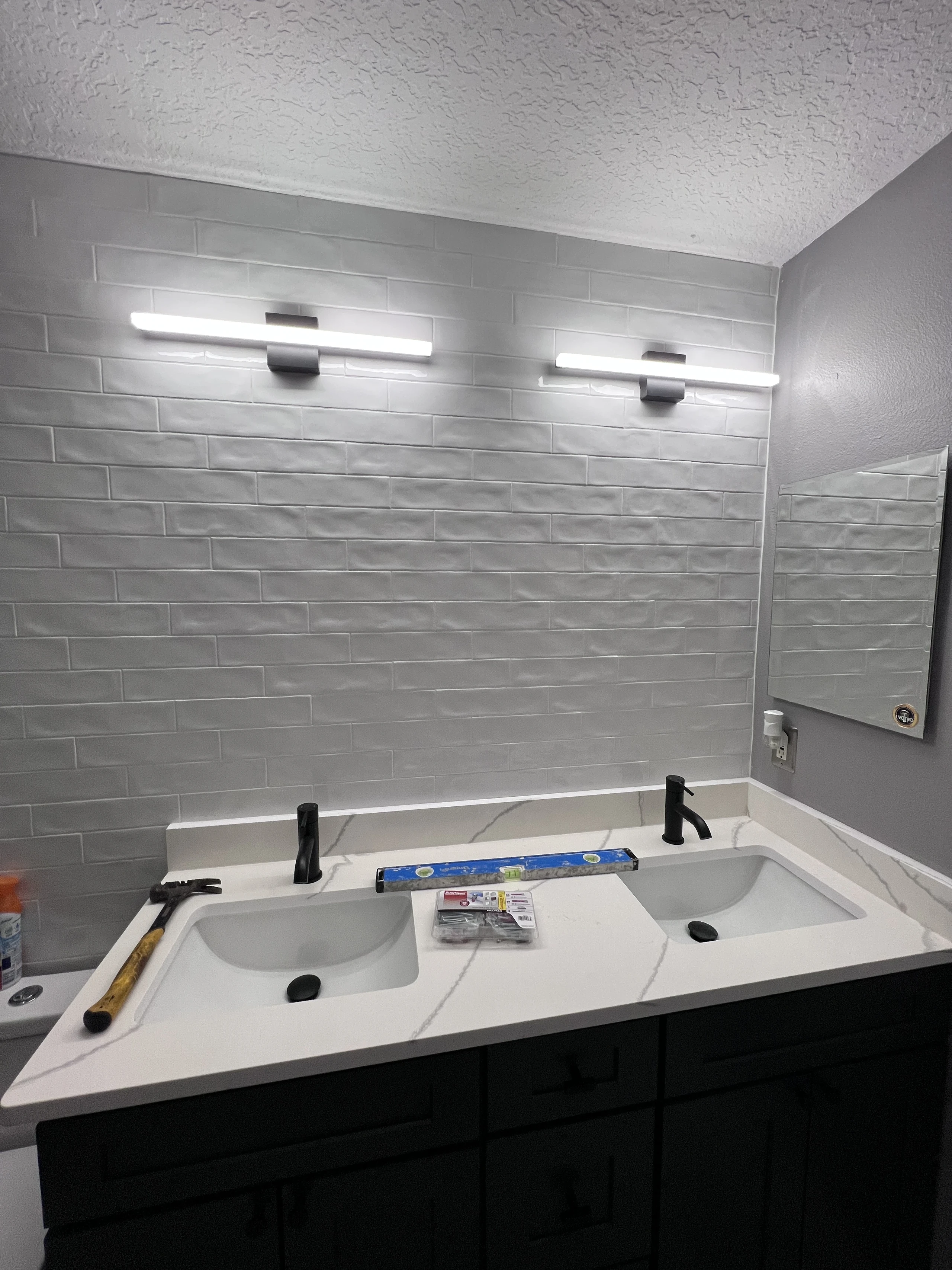 Double vanity wall before the mirrors were installed