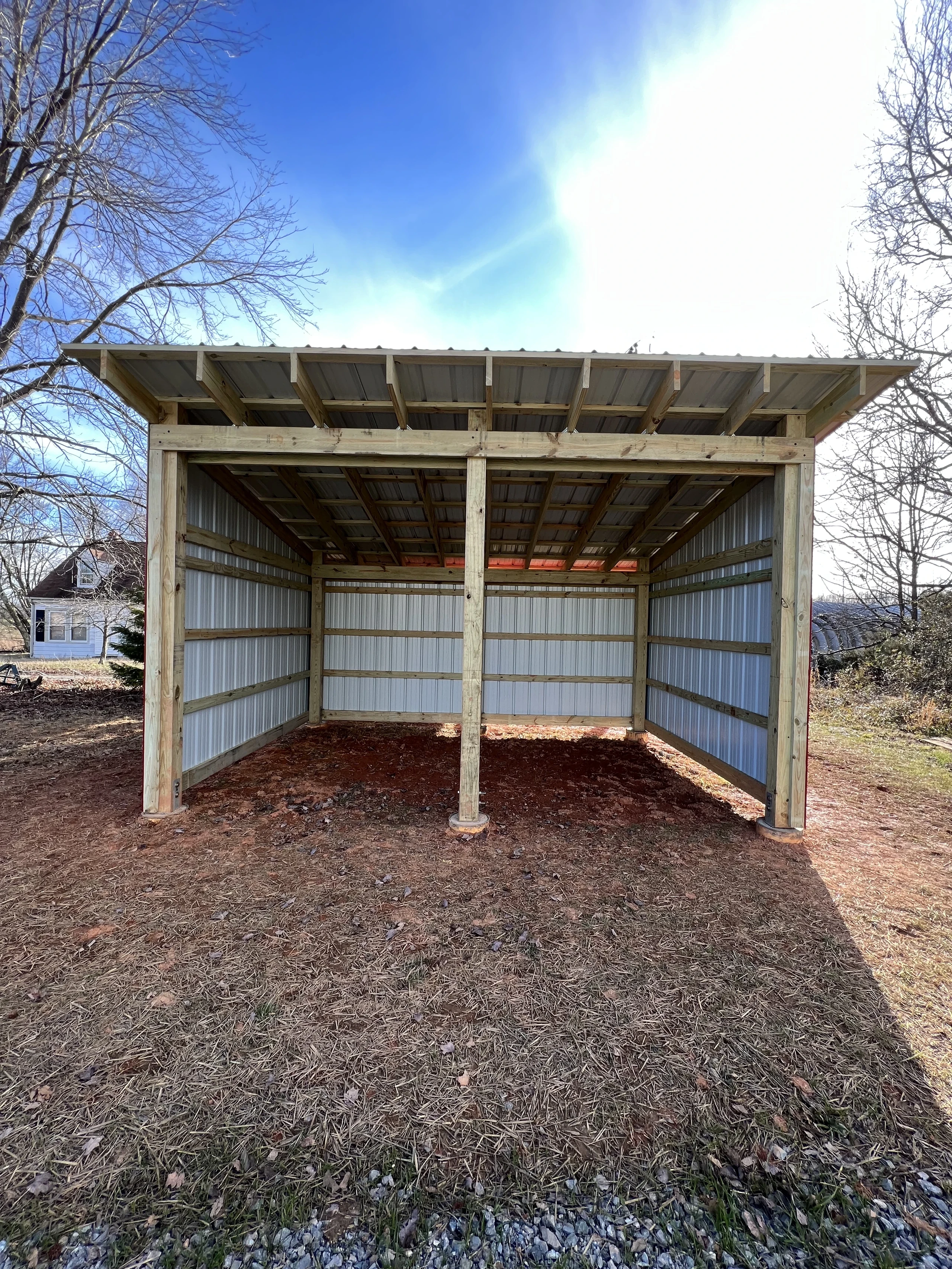 After photo 5 of the open-front storage shed