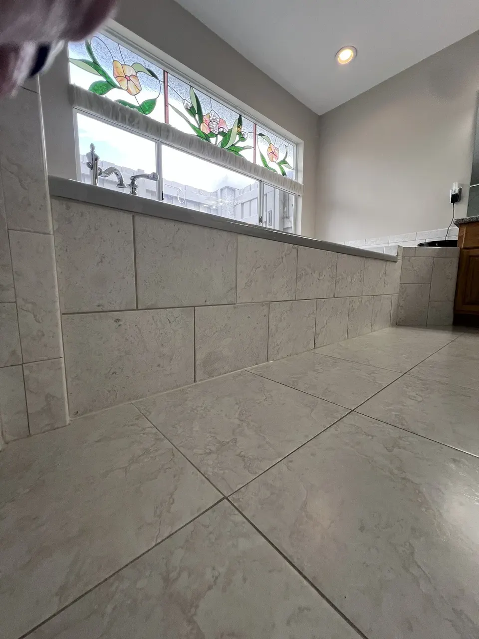 Finished removable tiled tub access panel in Jacksonville, Florida