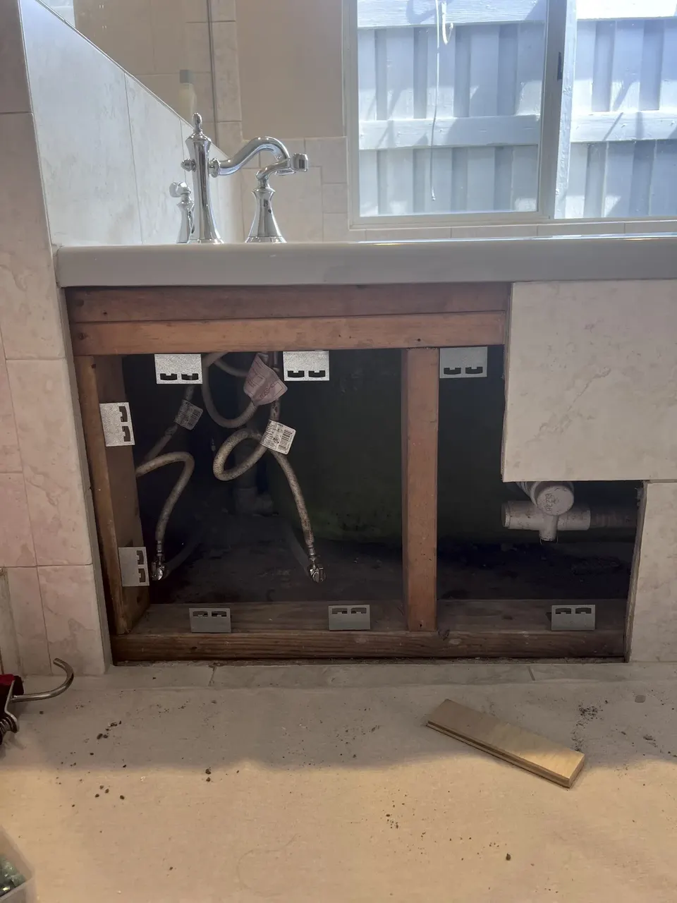 Support framing being prepared for the removable panel
