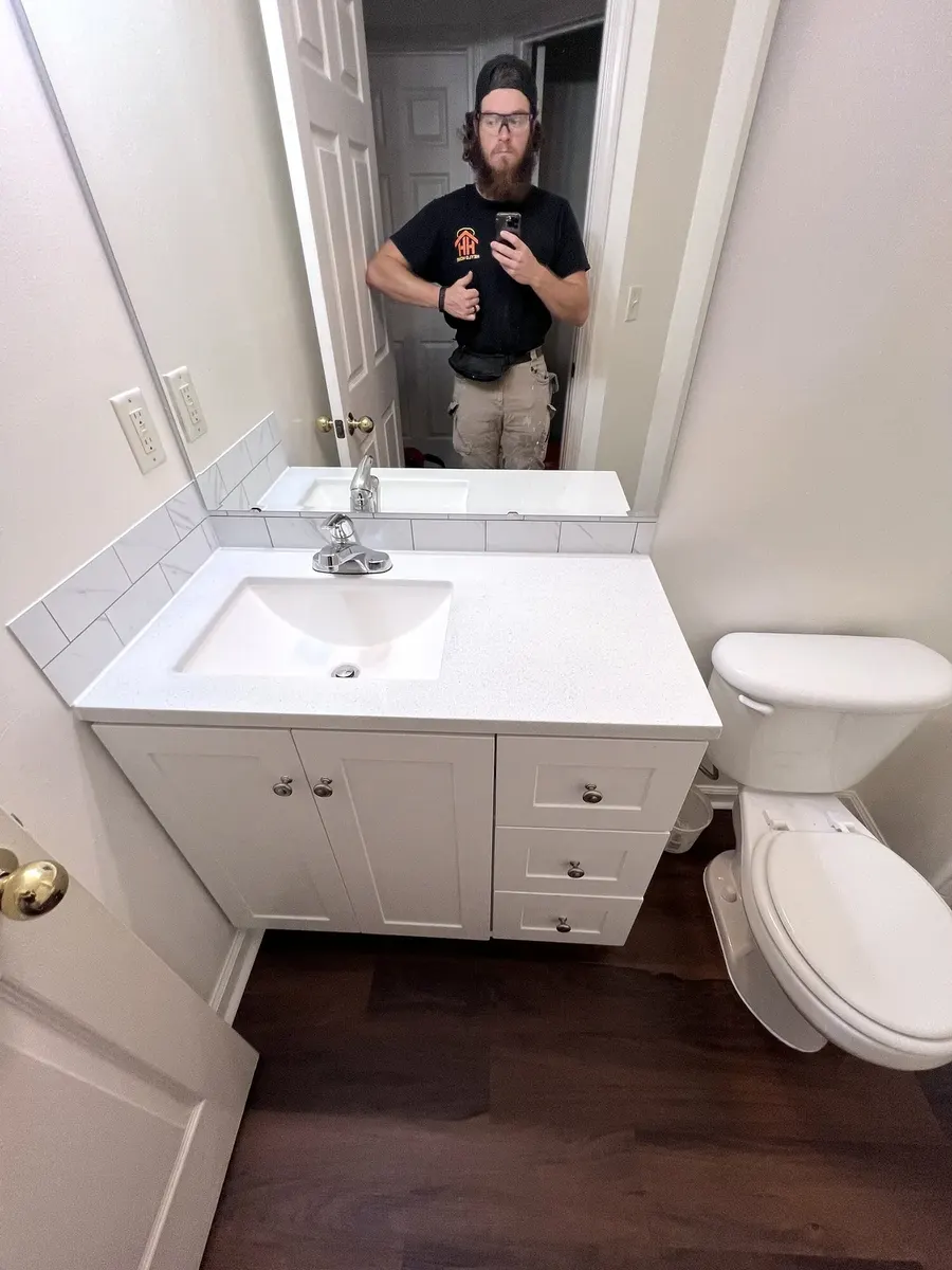 Finished vanity and flooring in the primary bathroom