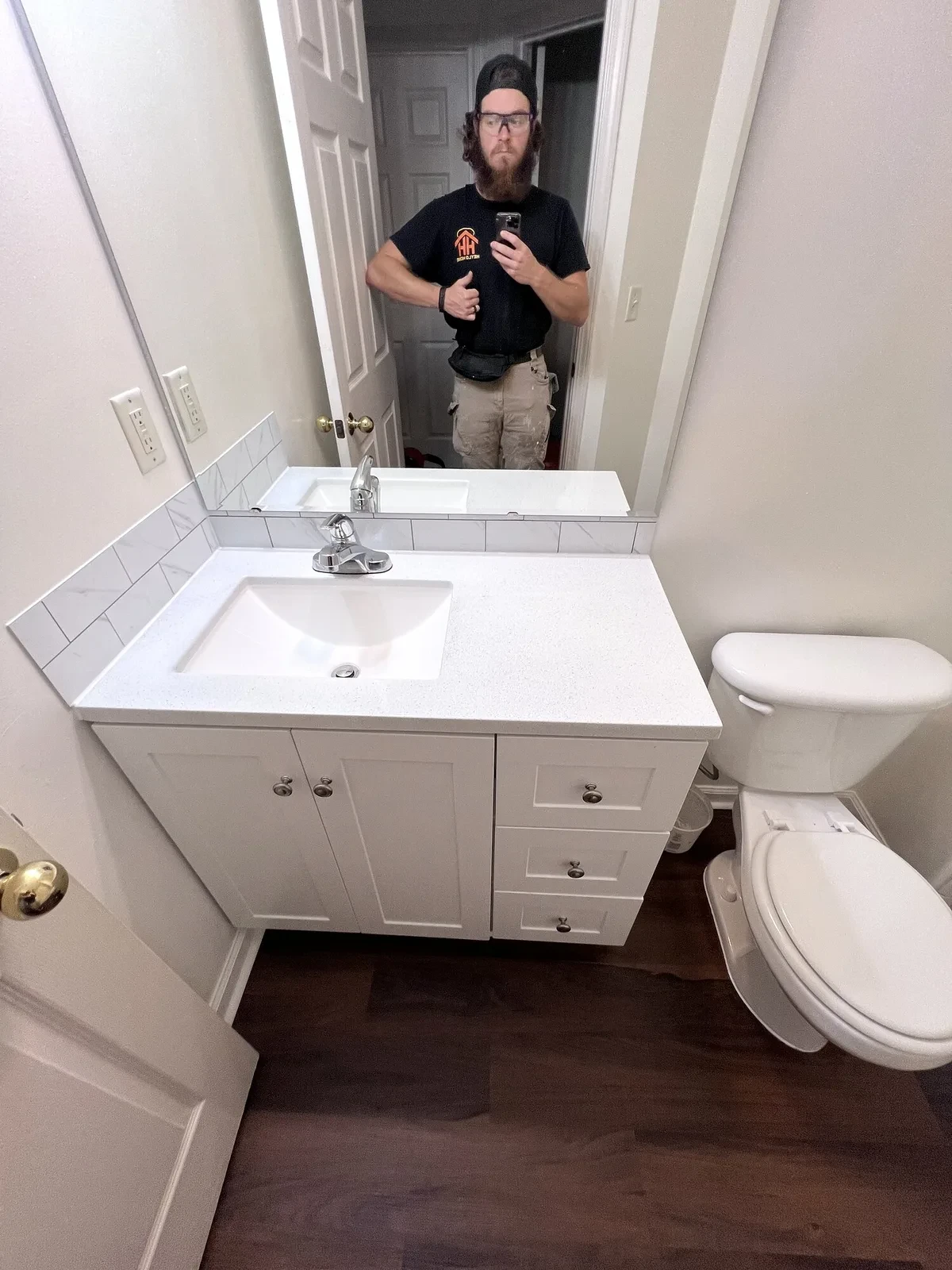 Finished vanity and flooring in the primary bathroom