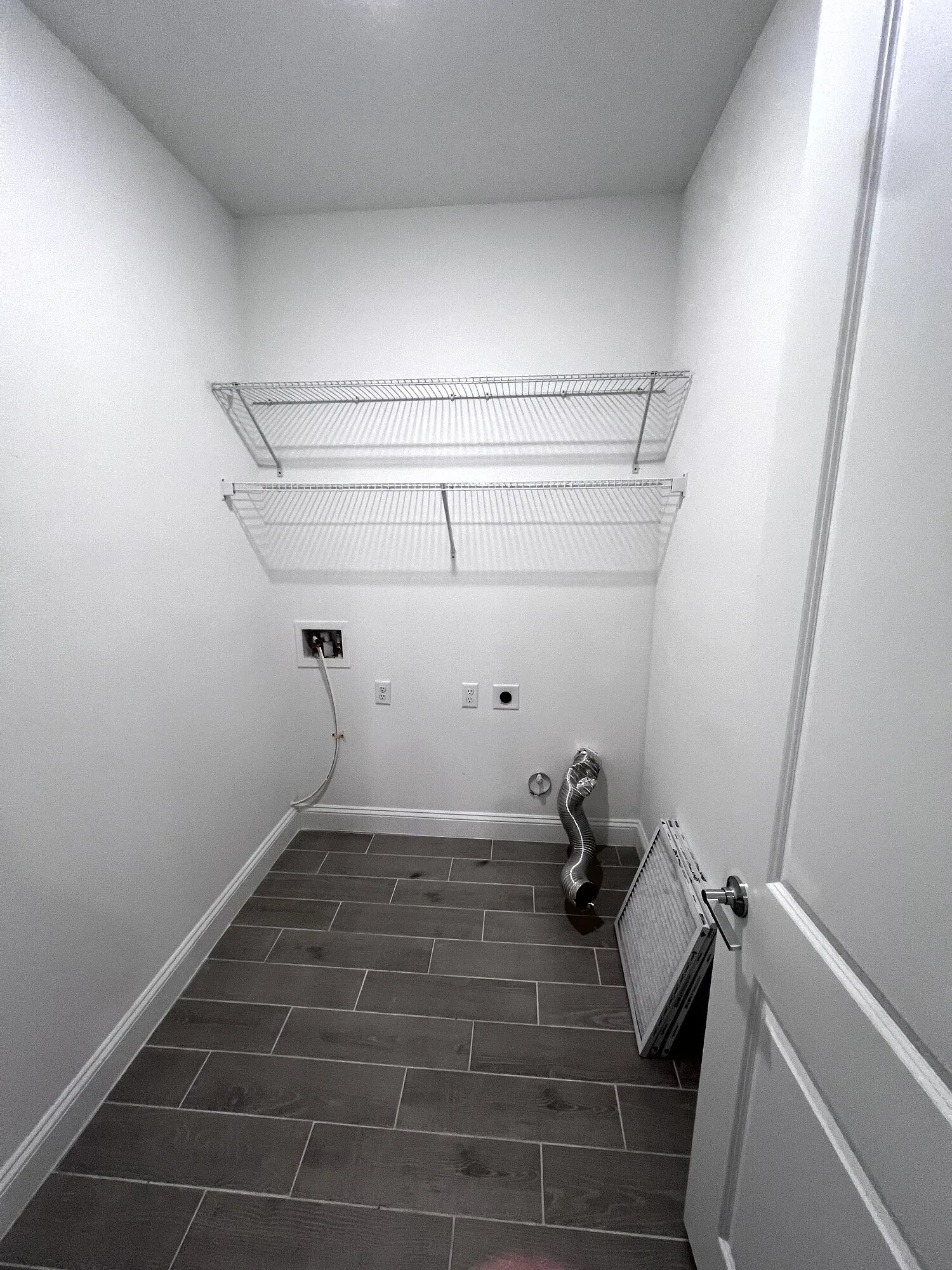 Laundry wall before overhead cabinets were installed