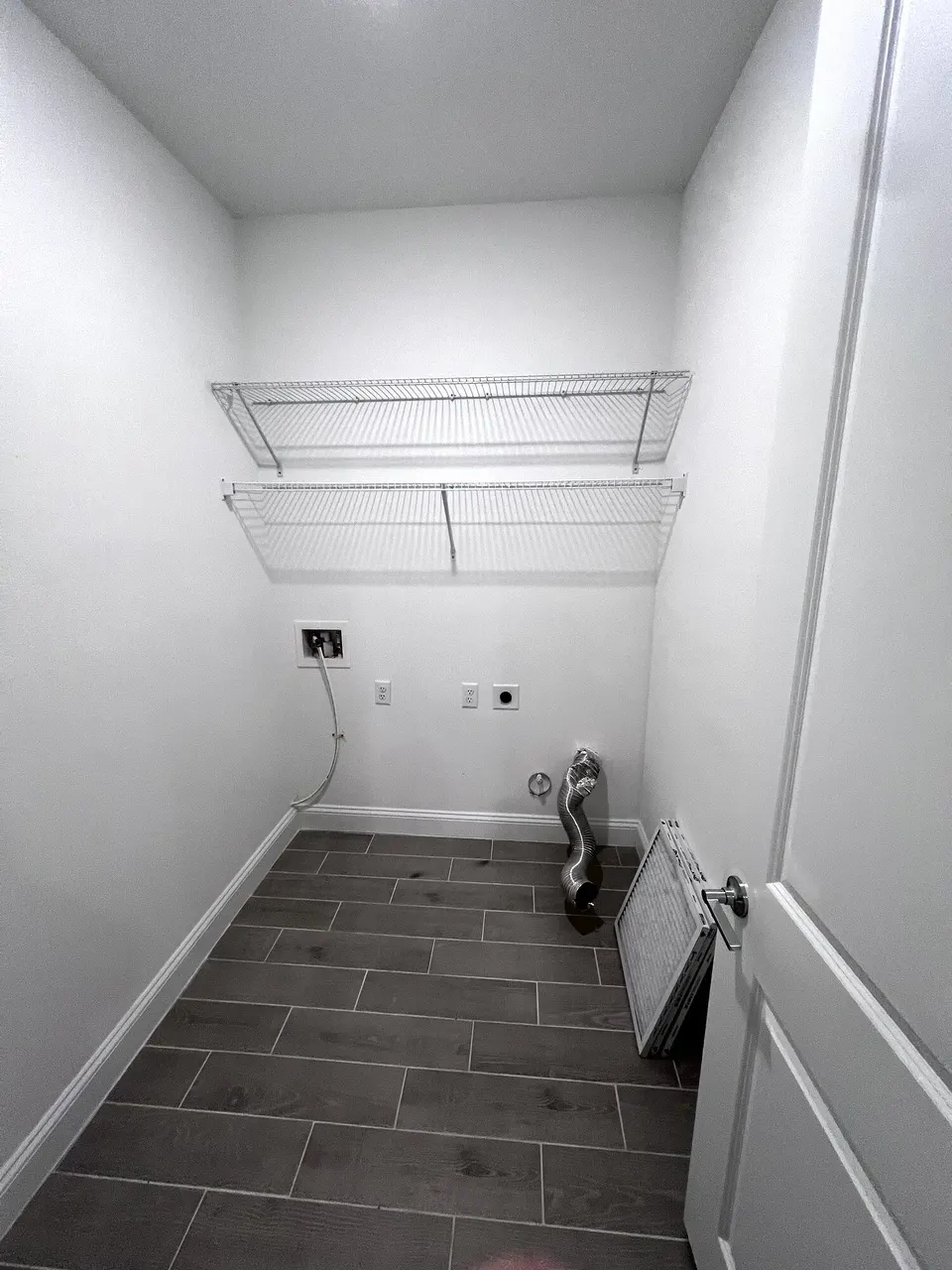 Laundry wall before overhead cabinets were installed